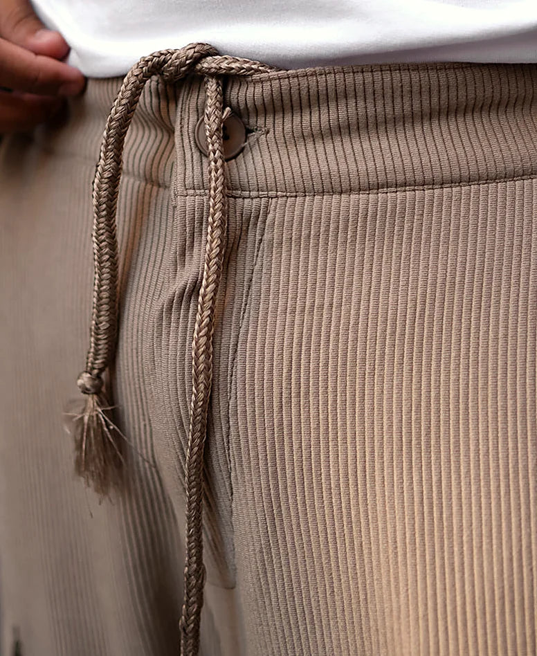 Beige pants with a baggy leg