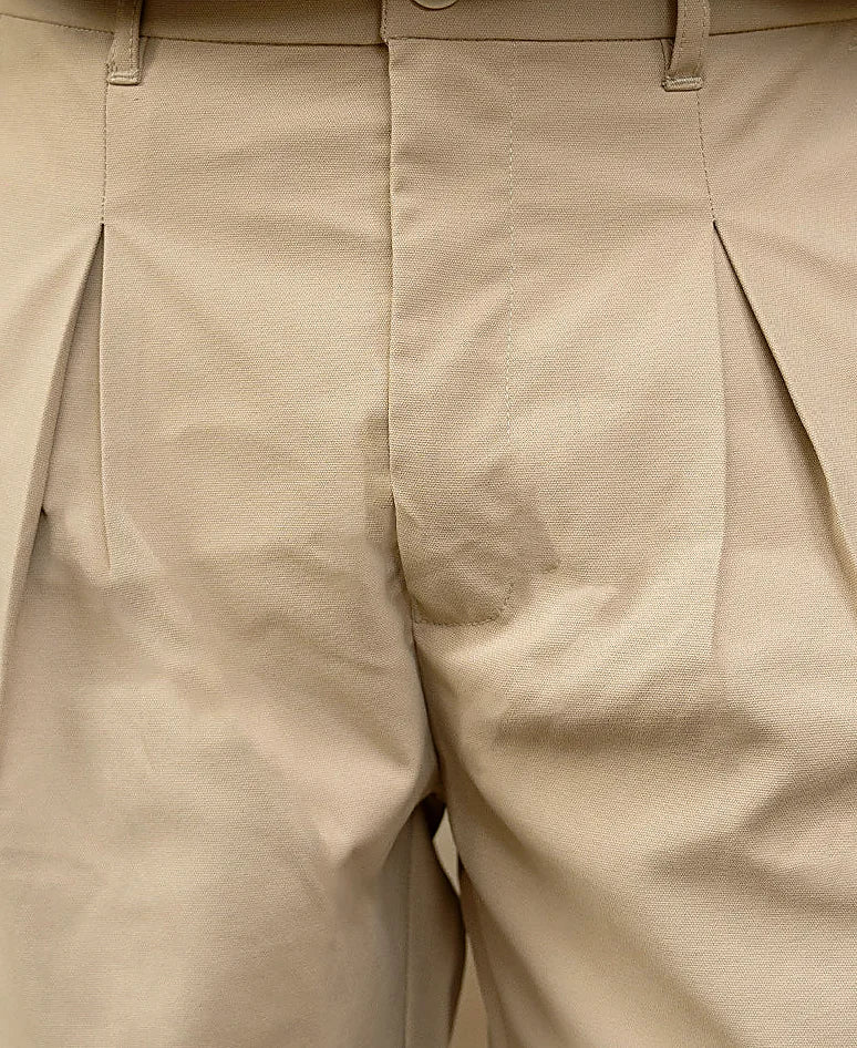 Trousers in beige, baggy fit