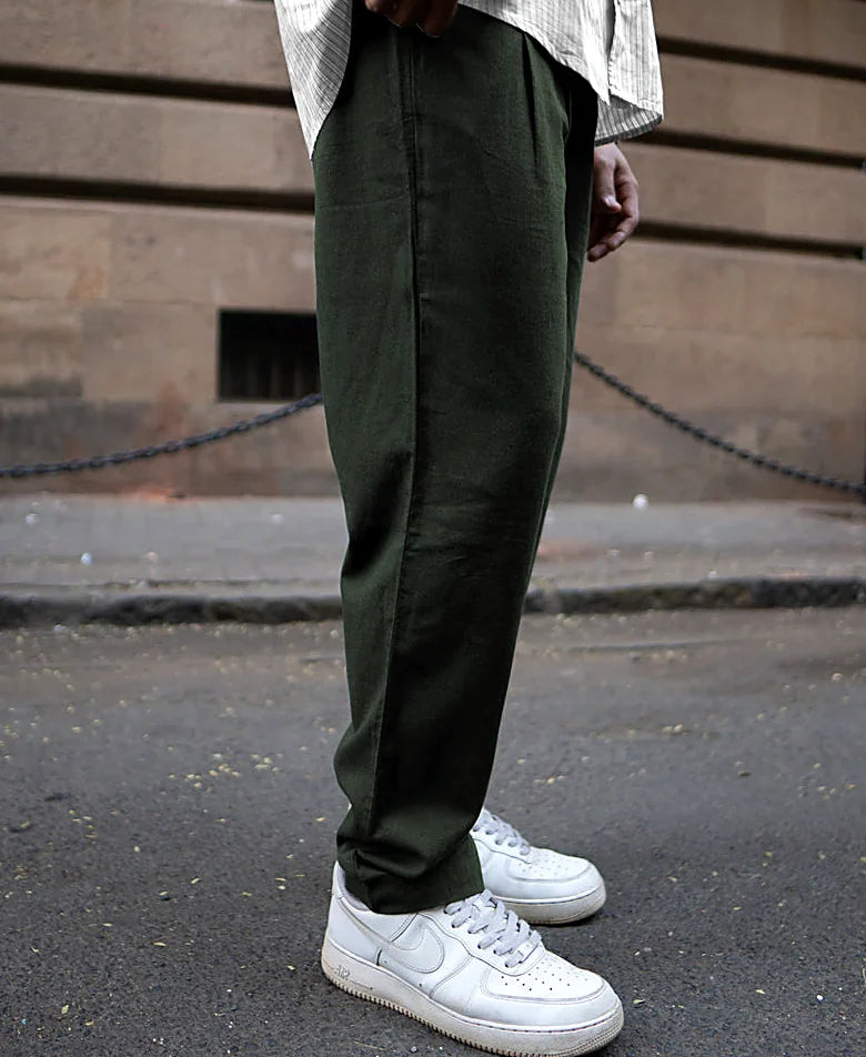 Pair of a neutral tone trousers