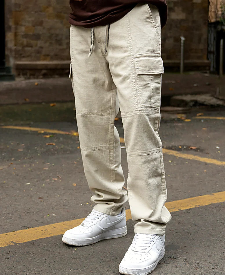 Beige relaxed pants for men